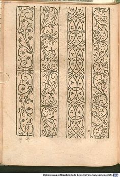 an old book with decorative designs on it