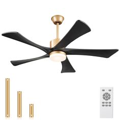 a ceiling fan with three black blades and two white remotes next to each other