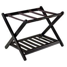 a black wooden rack with two shelves on each side and one shelf attached to it