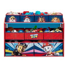 the paw patrol toy chest is red and blue with four drawers, each containing various toys