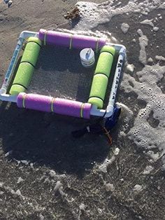 an inflatable water toy on the beach