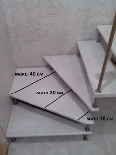 three white shelves with measurements for each shelf