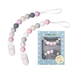 the baby pacifier is in its packaging and it's pink, grey and white beads