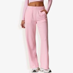 Stay comfortable and stylish with the Anna-Kaci Women's Elastic Waist Wide Leg Sweatpants. Featuring a relaxed wide-leg design and a stretchy elastic waistband, these sweatpants offer ultimate comfort for lounging or casual outings. The soft fabric provides a cozy feel, while the convenient side pockets add a functional touch. Perfect for pairing with a crop top, hoodie, or casual tee, these sweatpants are a versatile addition to your wardrobe. Whether you're running errands or relaxing at home, Sweatpants With Crop Top, Pink Sweats, Sweatpants With Pockets, Flared Leggings, Wide Leg Sweatpants, Casual Sweatpants, Crop Top Hoodie, High Waist Yoga Pants, Flare Leggings