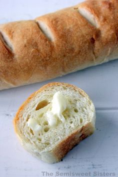 a loaf of bread with butter on it