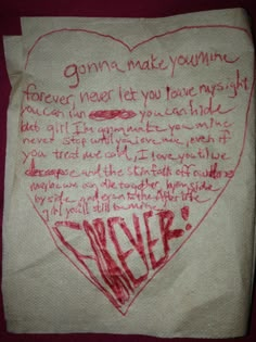 a piece of paper with writing on it and a heart - shaped handwritten note