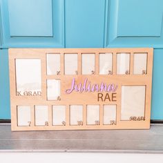 a wooden frame with the name juliana rae on it