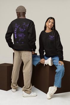 Introducing our pretty Unisex Heavy Blend Crewneck Sweatshirt, a must-have for those who love street wear fashion! This stunning sweatshirt boasts an eye-catching butterfly and flower design, perfect for anyone who appreciates the beauty of nature. Its rich purple color adds a touch of elegance, while the loose fit ensures maximum comfort. Made from a medium-heavy fabric blend of polyester and cotton, this sweater is not only cozy but also durable. The ribbed knit collar retains its shape even after washing, and the absence of itchy side seams ensures a seamless wearing experience. With a sewn-in label and accurate sizing, this brutalist inspired sweatshirt is a versatile addition to any wardrobe. Butterfly Sweatshirt, Street Wear Fashion, Love Street, Butterfly And Flower, Streetwear Mode, Rich Purple, Pretty Purple, Purple Butterfly, Knit Collar