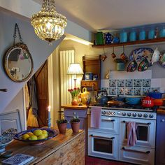 a kitchen with an old fashioned stove and oven