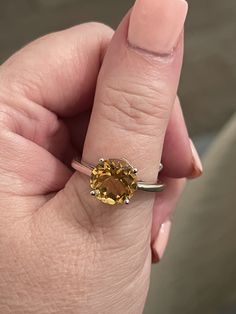 Namaste! See and feel the difference in our high end, boutique jewelry! Stunning 4.0CT citrine round classic .925 sterling silver ring size 8.5 Product Family: Anniversary/Engagement/Birthday/Confirmation/Communion Size: 8.5 Net Weight: 4.00 Grams (Including Gemstone & Silver) Main Stone: Citrine Base Metal: Sterling Silver, 925 parts per 1000 Metal Purity: 925 Stamped: Yes (925) Main Stone Creation: Natural Main Stone Size: 10x10 mm Brand: Desiregem Theme: Mixed Themes Metal: Sterling Silver Classic Yellow Citrine Birthstone Ring, Classic Citrine Birthstone Ring With Center Stone, Classic Yellow Topaz Ring In Prong Setting, Classic Yellow Gemstone Birthstone Ring, Classic Citrine Ring With Center Stone, Round Topaz Ring With Citrine Center Stone, Formal Citrine Solitaire Birthstone Ring, Classic Yellow Birthstone Ring With Gemstone, Classic Yellow Topaz Ring With Prong Setting