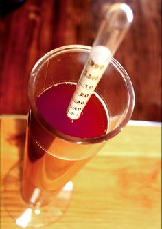 a blood test in a glass filled with liquid