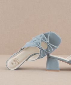 The Emerald | Blue Double Bow Peep Hole Sandal Feminine Summer Heels With Bow, Blue Bow Sandals For Spring, Spring Slip-on Heels With Bow, Blue Heels With Bow, Blue Wedding Shoe, Blue Bow Wedding Shoes, Light Blue Heels, White Textile, Emerald Blue