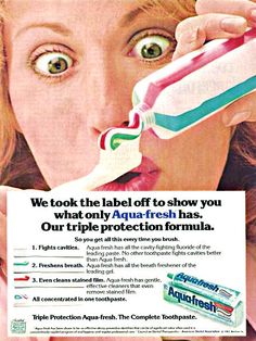 an advertisement for toothpaste featuring a woman brushing her teeth and holding a tube of toothpaste in front of her mouth