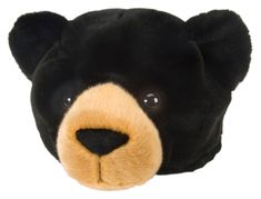 a black and tan teddy bear with big eyes