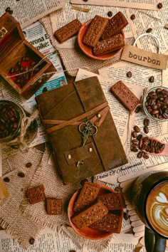 a table topped with lots of different types of food and coffees next to each other