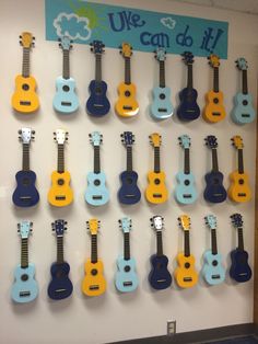 a group of guitars hanging on the wall