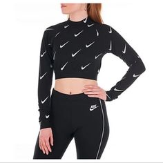 Nike Sportswear Cropped Top Size Medium Nwt! Black Long Sleeve Crop Shirt New With Tags! New Without Defects! Size Medium Measurements Are Located In Photos Black Metallic Nike Logo Throughout Soft And Stretchable Poly-Cotton Blend Fabric Nike Signature Branding Print Elastic Bottom Band Super Fast Shipping From A Smoke And Pet Free Home Feel Free To Ask Any Questions Thank You For Looking Winter Sportswear Tops In Black, Black Gym Tops For Fall, Winter Sportswear Tops For Workout, Black Tops For Gym In Fall, Winter Workout Sportswear Tops, Casual Winter Training Tops, Nike Sporty Tops For Fall, Nike Fitted Activewear For Fall, High Stretch Black Sportswear Top