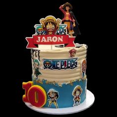 a birthday cake with one piece characters on it and the number 10 in front of it