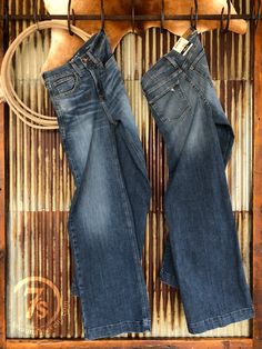 Ultra High Rise wide leg jean exclusive to Savannah 7s. The perfect medium wash denim. Whisker wash and hand sanding detail. Fitted through the waist and hips but not through the butt. Straight cut waist, not hour glass. 12" Ultra High Rise, based on a size 28. Rise will be slightly lower for smaller sizes and slightly higher for larger sizes. 12.5" wide leg opening, varies slightly based on size. By Ariat. 95% cotton/ 4% elasterell/ 1% lycra spandex. Inseams Length: Short 31", Regular 33", Long Western Jeans