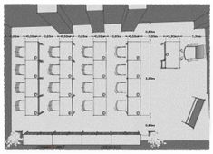 the floor plan for an office with tables, chairs and desks on each side