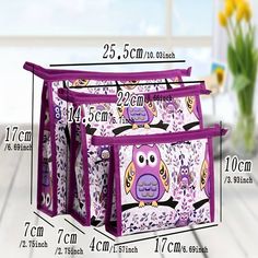 three storage bins with owls on them are shown in purple and white, along with measurements