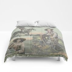 a bed with two pillows on top of it and a cowboy themed comforter cover