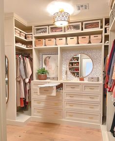 an organized closet with drawers, mirrors and other items on the shelves is shown in this image