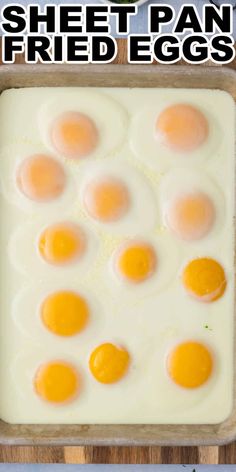 an image of eggs in a pan with the words sheet pan fried eggs on top