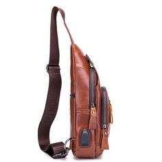 Discover the ultimate blend of functionality and style with our Genuine Leather Crossbody USB Bag. Designed for the modern, on-the-go individual, this bag combines premium craftsmanship with innovative features, available in both classic brown and sleek black. Dimensions & Material: Measuring 16cm x 7cm x 30cm, this bag is crafted from high-quality leather that ensures durability while maintaining a luxurious appearance. The size is perfect for daily essentials without being cumbersome. Smart Features: Equipped with a built-in USB charging port, this bag allows you to stay connected and charge your devices on the move effortlessly. Never worry about running out of battery during your daily commutes or travel adventures. Interior Organization: The interior is thoughtfully designed with mult Korean Shop, Interior Organization, Cart Icon, Leather Roll, Classic Brown, Vintage Canvas, Stay Connected, Daily Essentials, Anti Theft