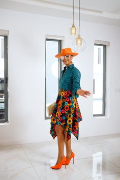 Muna Set is Back!!! Bestseller alert! High waist asymmetrical skirt. Pockets? Yes Long sleeve crop zip up shirt. Cotton African prints. Top is soft lined. Skirt is unlined. Model wears a size S and is 5’ 9 Skirt has a back zipper. Sold as a set. Hat from Anchiel.com Muna set is a bestseller and has sold out 6x already, pre-order the VS3 version now before it's gone. Disclaimer: Ace Kouture is committed to bringing you 100% REAL & Authentic African Fashion. ALL of our items are created with texti Fitted High-low Hem Skirt For Spring, Trendy High-low Hem Skirt For Spring, Spring Fitted High-low Hem Skirt, Zip Up Shirt, Ankara Skirt, Skirt Pockets, Cruise Collection, Cropped Zip Up, African Prints