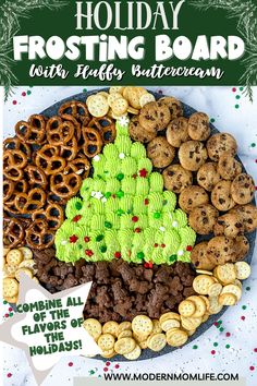 a holiday frosting board with cookies, pretzels and christmas trees on it