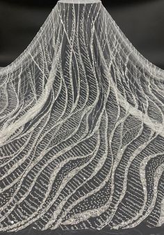 Description Heavy Beaded Embroidery Lace Fabric,Bridal Dress Lace Fabric, Couture Lace Fabric , Wedding Dress Lace , 3D Embroidery Lace By Yard It is perfect for amazing bridal dresses, dress making, bridal wear or wedding gowns. Color: off-White Net: off-white Material : Beads ,Sequin,Rayon ,Pearls Wide: 51 Inch (130cm) Price is set for 1 yard/91,5 cm. You will receive the fabric in one continuous piece if you purchase more than 1 yard. If you need more information about the lace please contact us. Please note, there might be a slight difference in the color according to PC and Mobile devices! If you want to check the color and quality, you can order a swatch. Bead Lace, Wedding Dress Lace, Bridal Dresses Lace, Beaded Tulle, 3d Embroidery, Embroidery Lace, Tulle Wedding, Lace Embroidery, Tulle Wedding Dress