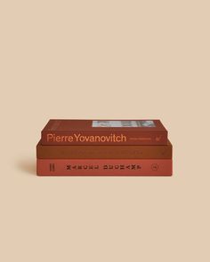 three books stacked on top of each other in front of a beige background with the title pierre yovanovvichtch