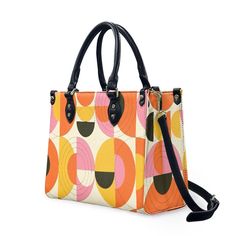 • Elevate your style with our retro style 60s Space Age Opt Art Handbag, a chic fusion of mod and vintage aesthetics inspired by the iconic designs of the 60s.• This Mod 60s Handbag features a mesmerizing geometric opt art pattern print in vibrant shades of orange, pink, yellow, and black, adding a bold and artistic touch to any outfit.• Crafted from premium PU leather, this Retro Handbag Women boasts an exquisite zipper closure and comes with a removable strap for added versatility.• Available in three sizes - small, medium, and large - and with two handle options in black and white, this 60s Style Handbag offers both style and practicality for every occasion.**Designed in California by Trendy Hip Buys. Made to order from overseas.