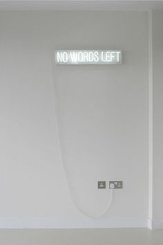 there is a sign that says no words left on the wall