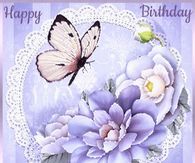 a birthday card with flowers and a butterfly