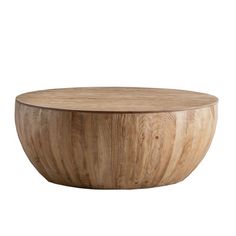 a round wooden table sitting on top of a white background