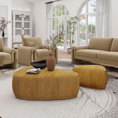 a living room with couches, chairs and a coffee table in front of a large window