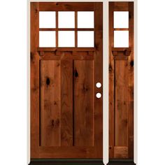 the front door is made out of wood and has two sidelights on each side