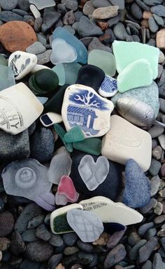 many different colored rocks and stones on the ground