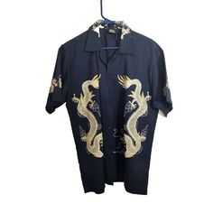 Anchalee Dragon Chinese Short Sleeve Button Shirt Adult Large Vtg Blue Ec This Anchalee Short Sleeve Button-Up Shirt Is A Unique Addition To Any Wardrobe. The Shirt Features A Dragon Pattern And A Classic Fit, Perfect For A Casual Or Semi-Formal Look. The Blue Color And Asian Theme Add To The Shirt's Overall Charm. It Is Made Of Cotton Material And Is A Vintage Item In New Without Tags (Nwot) Condition. The Shirt Is A Size Large And Has A Button Closure. It Is Classified Under The Categories Of Vintage Beach Shirt With Buttons, Vintage Blue Blouse For The Beach, Vintage Blue Blouse For Beach, Vintage Buttoned Shirt For Beach, Vintage Blue Beach Blouse, Vintage Blue Collared Hawaiian Shirt, Vintage Button-up Beach Top, Vintage Blue Beach Shirt, Blue Vintage Beach Shirt