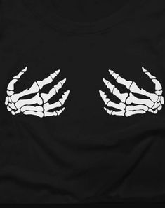 two white hands on black t - shirt