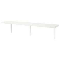 a long white table with two legs on the top and one leg up against it