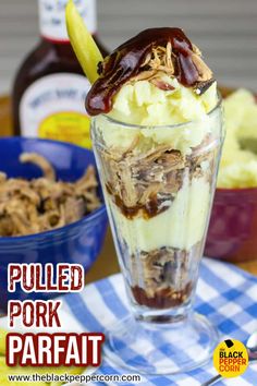 pulled pork parfait in a glass on a table