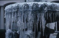 icicles hanging from the side of a building