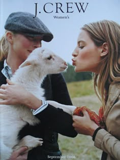 the cover of j crew's women's magazine features a woman holding a lamb