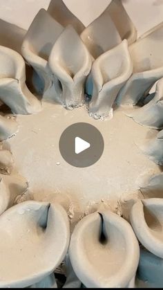 an image of a vase being made with clay