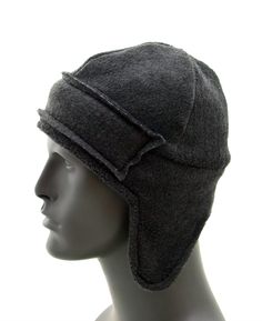 "For those brutal cold days protect your head and ear with this snuggle ear flap hat. This hat is made from soft stretch polar fleece, also lined with fleece making it super warm. A 2.5\" high strip is stitched to the front to keep the forehead extra warm. The height of the hat is 9\" (not including the ear flap), and is custom made to your head size. You can select your head size from the drop down box. * 100% Polyester * Self Lined * Hand/Machine Wash * Handmade in USA" Adjustable Beanie With Ear Flaps For Outdoor, Winter Outdoor Bonnet With Ear Flaps, Adjustable Brimmed Bonnet For Cold Weather, Warm Bonnet With Ear Flaps, Warm Hats With Ear Flaps For Cold Weather, Warm Beanie With Ear Flaps, Adjustable Fleece-lined Beanie For Winter, Adjustable Winter Beanie With Fleece Lining, Adjustable Windproof Beanie For Cold Weather