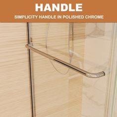 a bathroom with a glass shower door and handle