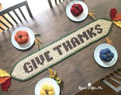 the table is decorated with crochet and knitted fruit